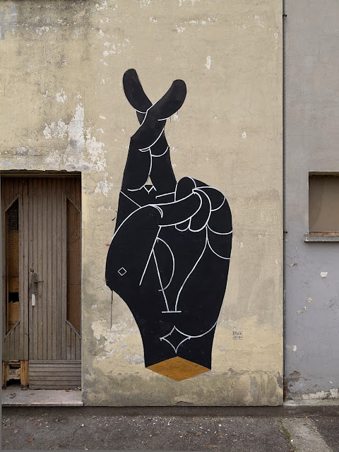 New Hands mural by Italian street artist Basik in the city of Rimini in Italy. 3
