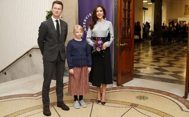 Crown Princess Mary wore a Banora gathered-neckline silk-blend blouse by Hugo Boss. Dulong diamond pearl earrings