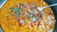 Adding fenugreek leaves Red Chilli powder sugar and salt in cashew tomato mixture for butter chicken Murgh makhani recipe