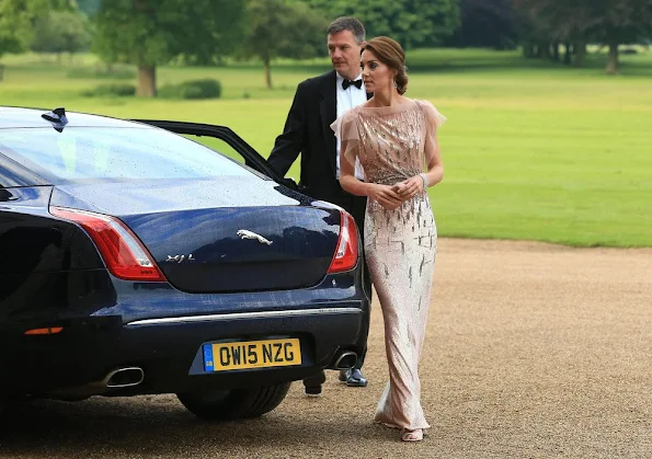 Prince William and Kate Middleton attended a gala charity dinner in support of East Anglia's Children's Hospices. Kate wore Jenny Packham gown