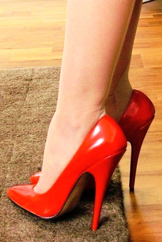 Red pumps and seamed nude tights