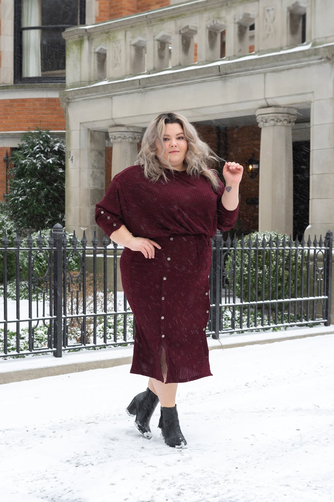 Chicago Plus Size Petite Fashion Blogger, youtuber, and model Natalie Craig, of Natalie in the City, reviews Soncy's Ruby Red Midi Skirt and Cropped Top.