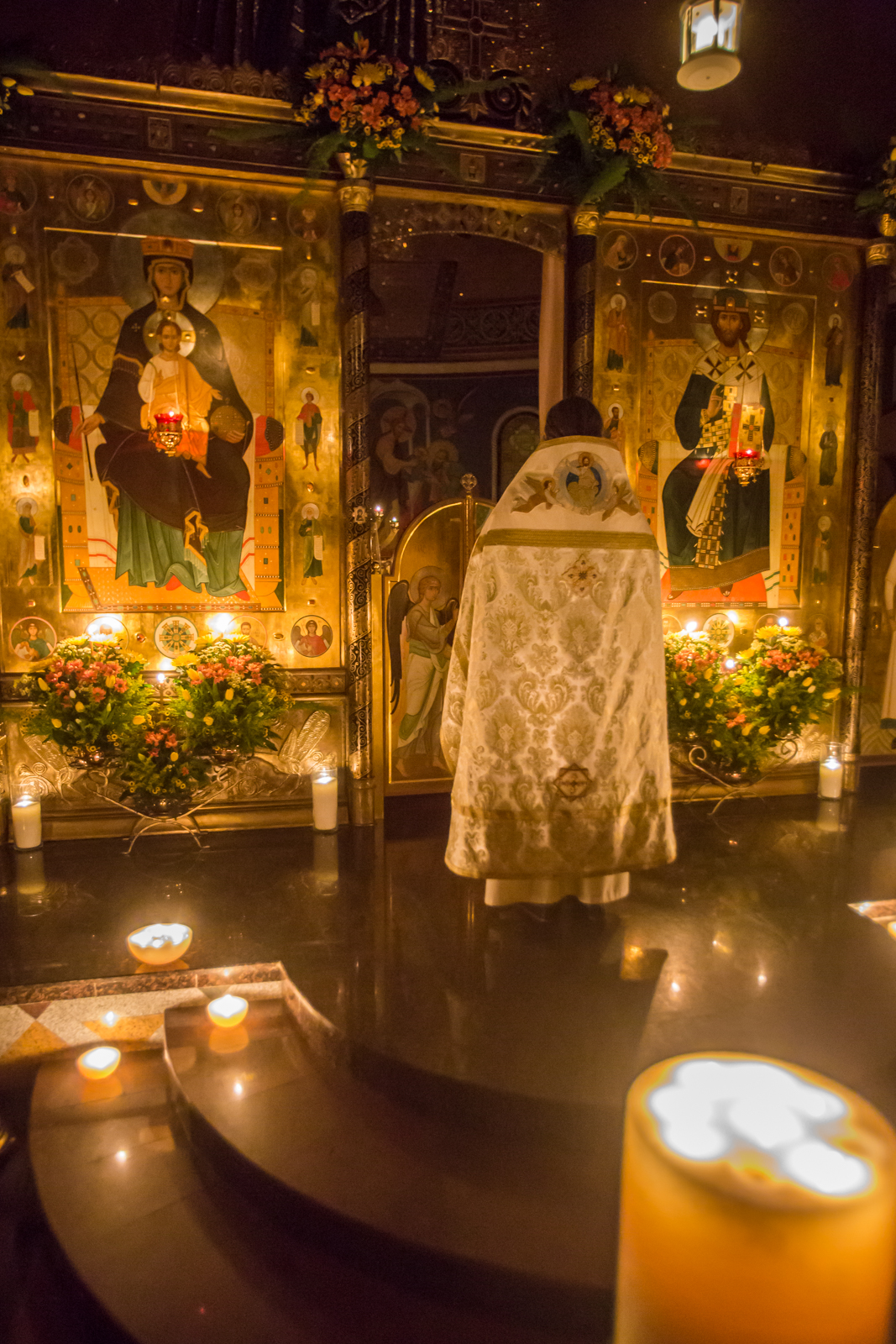 Why do Orthodox Christians pray facing East and why does the priest not