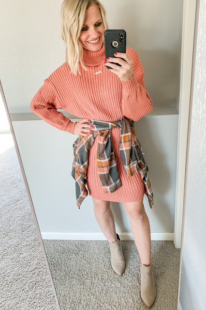 Orange sweater dress with a plaid flannel shirt