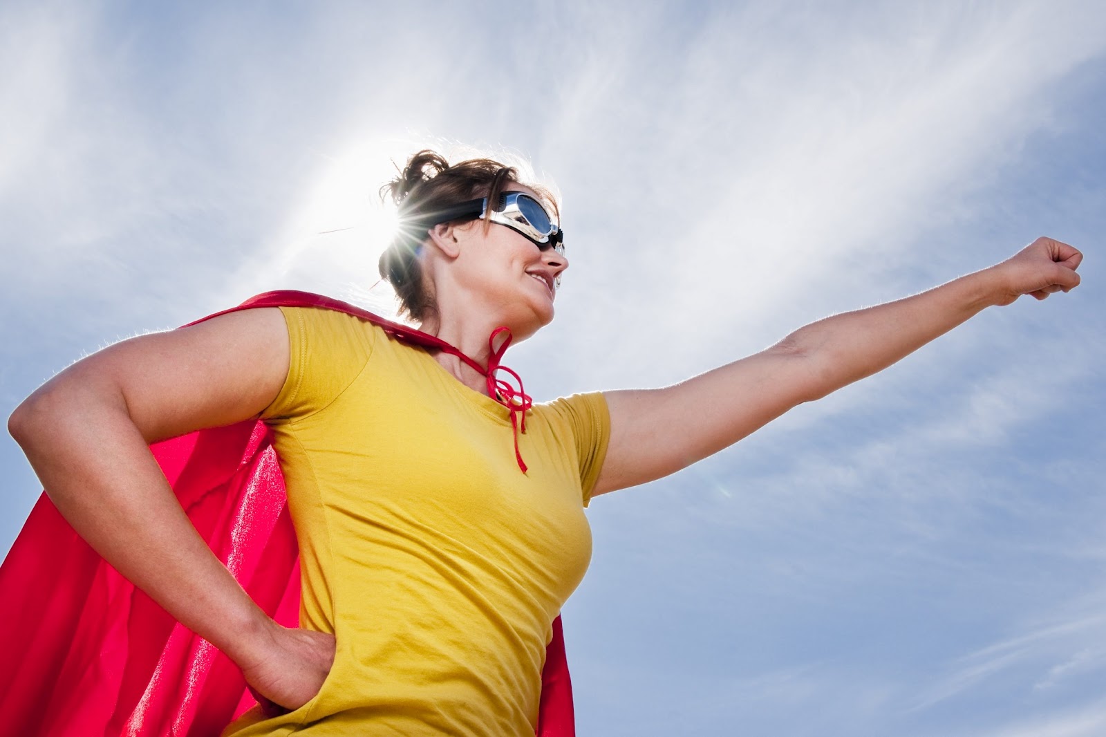 hero-woman-red-cape-blue-sky.jpg
