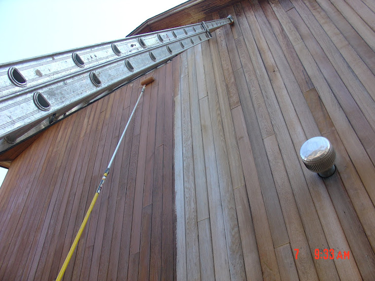 Long pole and ladder help us when staining exterior siding, Long Island NY