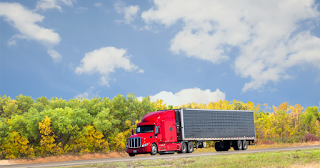 Trucking down the highway, up to date on truck taxs like IFTA fuel tax and Form 941.