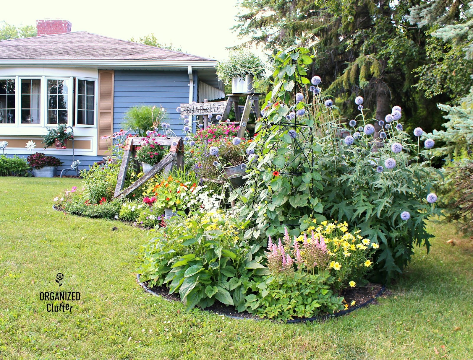 The Front Yard Flower Border 2012-2020 - Organized Clutter