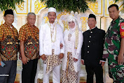 Serma Mian  Babinsa 02/Tambora Adakan Komsos Diacara Pernikahan Siti Monika-Gunardi