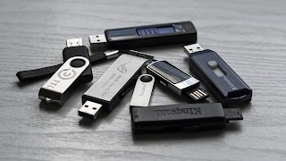 A bunch of USB sticks in a pile