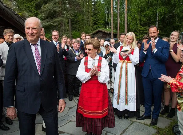 Queen Sonja, Crown Princess Mette-Marit, Crown Prince Haakon and King Harald attend garden party at Open-air Museum in Lillehammer