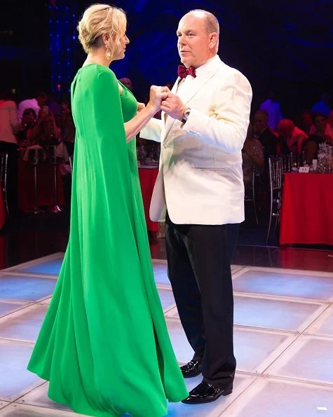 Princess Charlene wore a new green cape effect crepe gown by Marchesa. Princess Charlene wore Marchesa notte green cape effect crepe gown