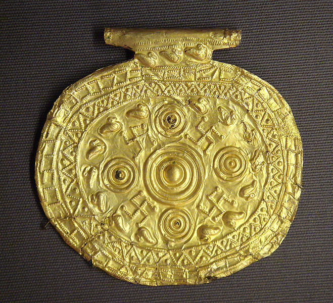 Etruscan pendant with swastika and heliocentric diagram