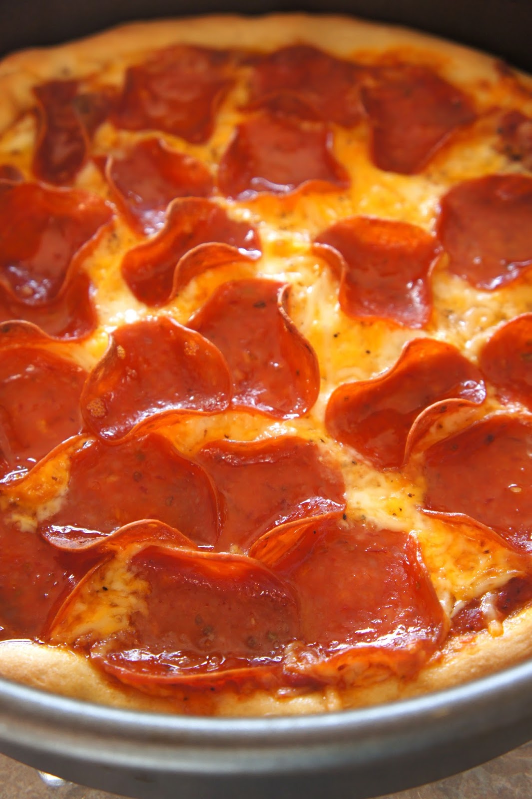 Savory Sweet and Satisfying Three Cheese Pan Crust Pizza