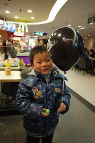 little boy with a Dickies balloon