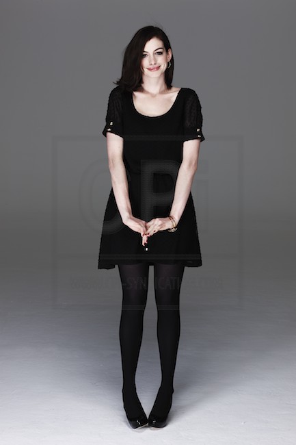 Celebrity Legs and Feet in Tights: Anne Hathaway`s Legs and Feet in