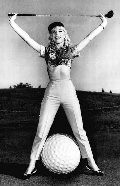 Barbara Eden with giant golf ball