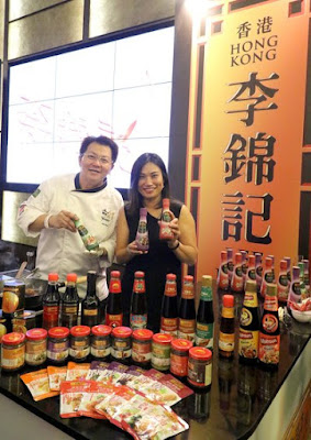 May Lim, MD– South East Asia, Middle East, Africa & India of Lee Kum Kee (right) and Chef John See (left) at the World Gourmet Summit Opening Reception. Source: Lee Kum Kee International Holdings. 