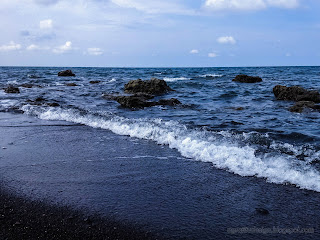 Exotic Rocky Beach Scenery And The Seawater Waves At Umeanyar Beach, North Bali, Indonesia