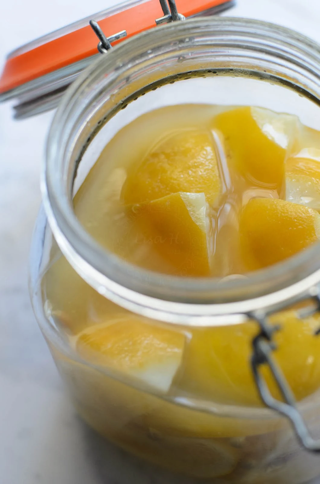 preserved lemons in a jar, ready for consumption photo