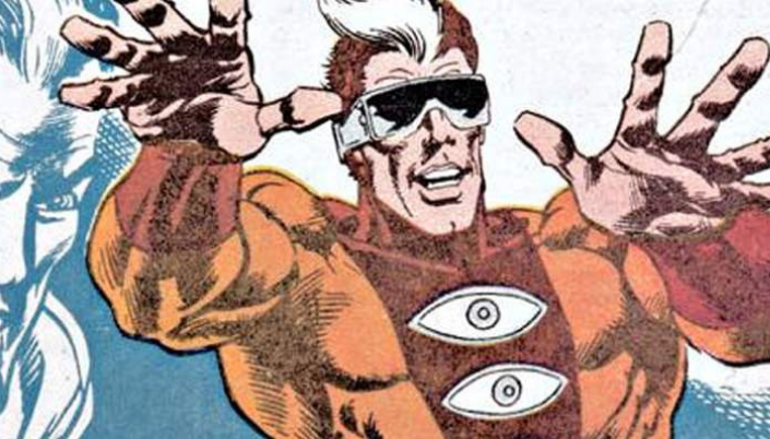 Imagem: o personagem Homem com Dez Olhos, um homem branco com um traje laranja com detalhes marrons e no peito um símbolo de olho e um par de óculos escuros cobrindo os olhos.