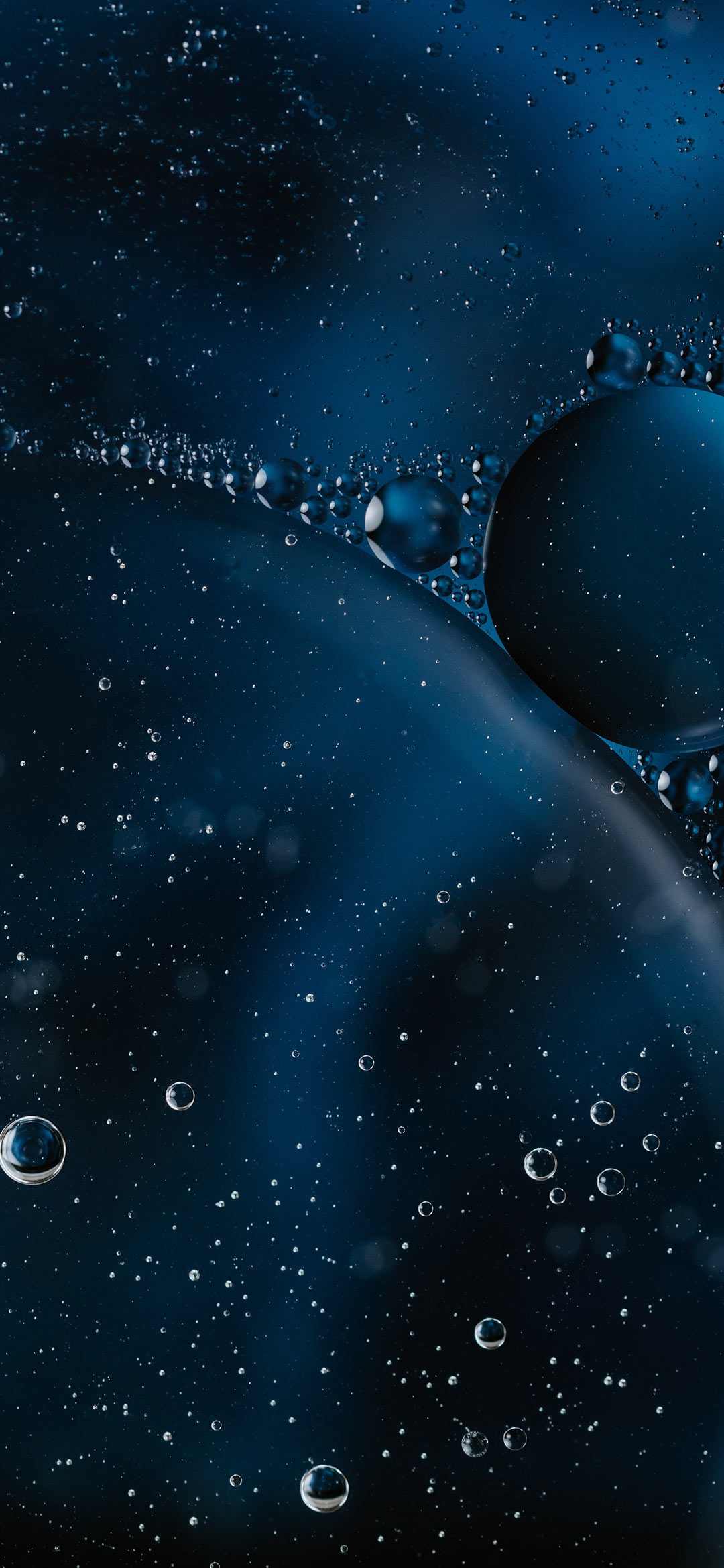 air-bubbles-trapped-in-blue-liquid-wallpaper