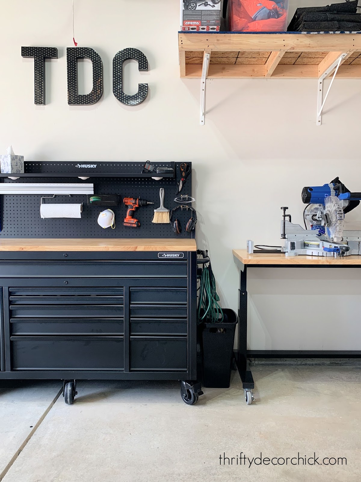 black and wood rolling tool benches