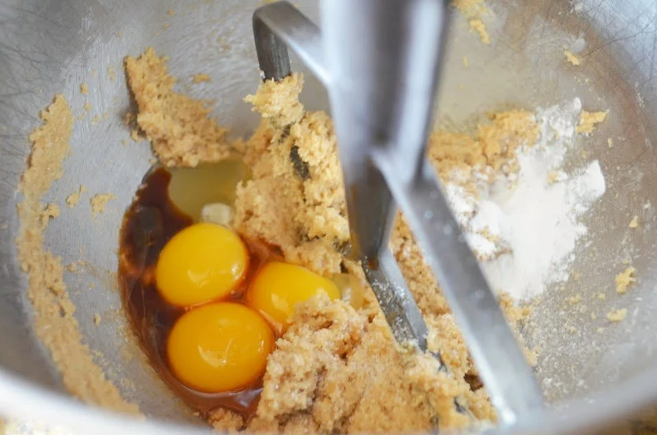 1 Egg, 2 Egg Yolks, Vanilla, Baking Powder, and Salt add to Mud Hen batter.