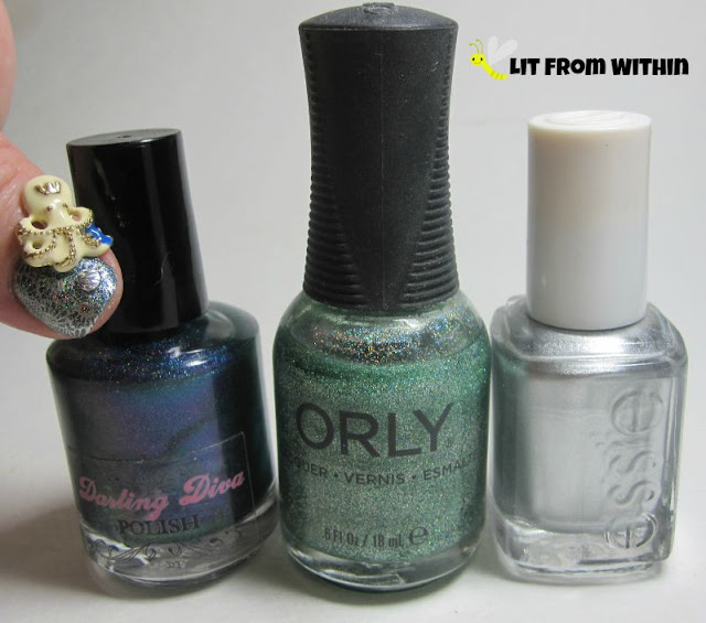 Bottle shot:  Darling Diva Polish Prototype, Orly Sparkling Garbage, and Essie No Place Like Chrome.