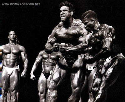 Robby Robinson winning over the mighty Lou "The Hulk" Ferrigno Pose down at the first Mr Olympia Masters; Atlanta, GA 1994 - Read  about RR's training and life experience, about other legends of Golden Era of  bodybuilding and what really happened behind the scenes  of Weider's empire in  RR's BOOK "The BLACK PRINCE;  My Life in Bodybuilding: Muscle vs. Hustle" ● www.robbyrobinson.net/books.php ●