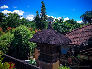 Balinese Hindu Shrines Of The House In The Clear Blue Sky In Bali