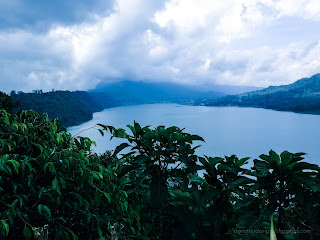 Natural Scenery Cloudy Atmosphere On Mountains Lake Buyan At Wanagiri Village, North Bali, Indonesia