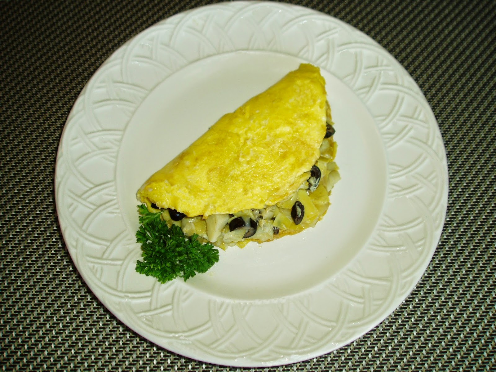 Meatless Mediterranean Artichoke Omelette with Black Olives and Provolone