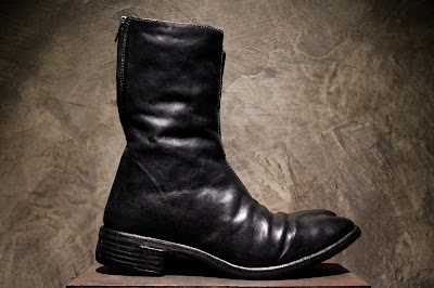 black boots with silver buckles