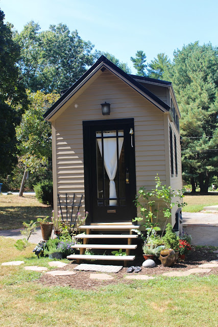 Tiny House with metal roof and cute siding :: OrganizingMadeFun.com