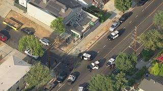 Suspect killed, security officer wounded after gun battle outside L.A. marijuana dispensary