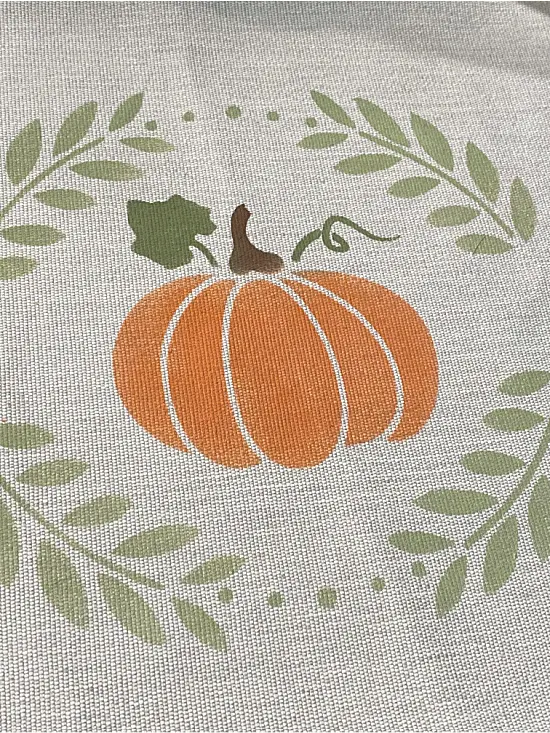 pumpkin and wreath stencil on a placemat