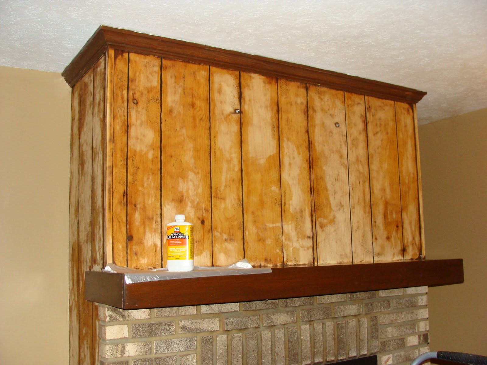 FabTwigs Wood Paneling Fireplace Makeover How to Fill Grooves