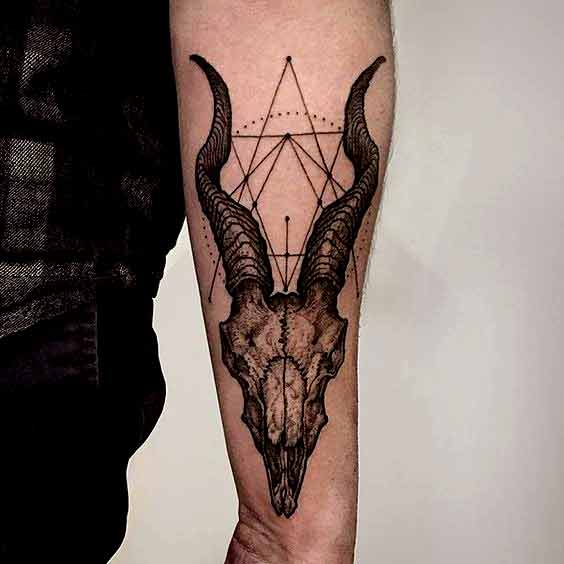 Geometric capricorn tattoos on arm