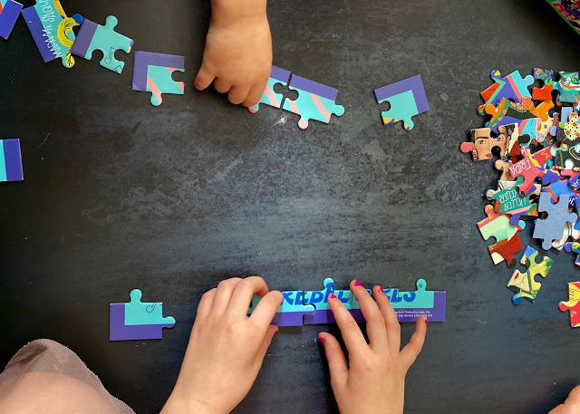 Putting the edge pieces together Creating the frame by putting the edge pieces together on the 100 piece rebel girls jigsaw