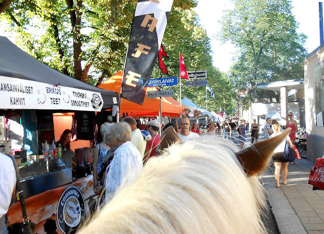 International market by the river Aura