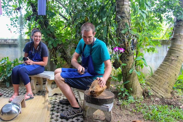 Thai Secret Cooking Class Cracking coconuts to make home made coconut milk. June 22-2017