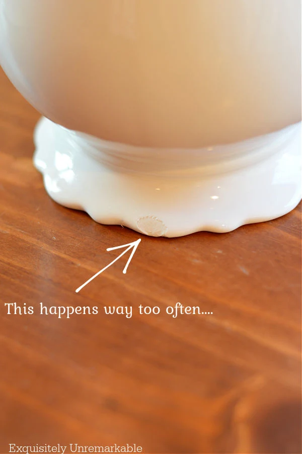 Chipped vase base the words this happens way too often and an arrow