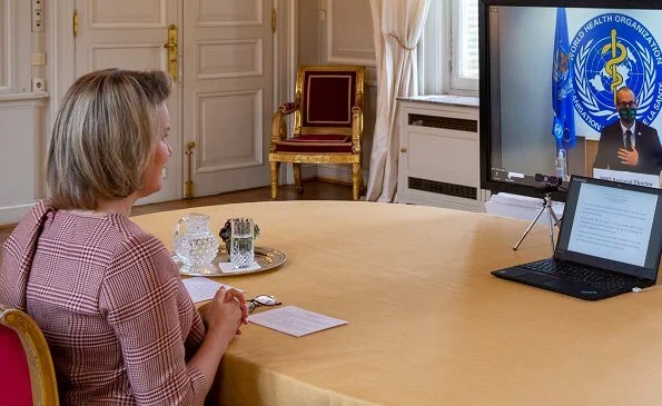 Queen Mathilde of Belgium wore a new checked half sleeve dress from Natan. Edouard, baron Vermeulen is a Belgian fashion designer