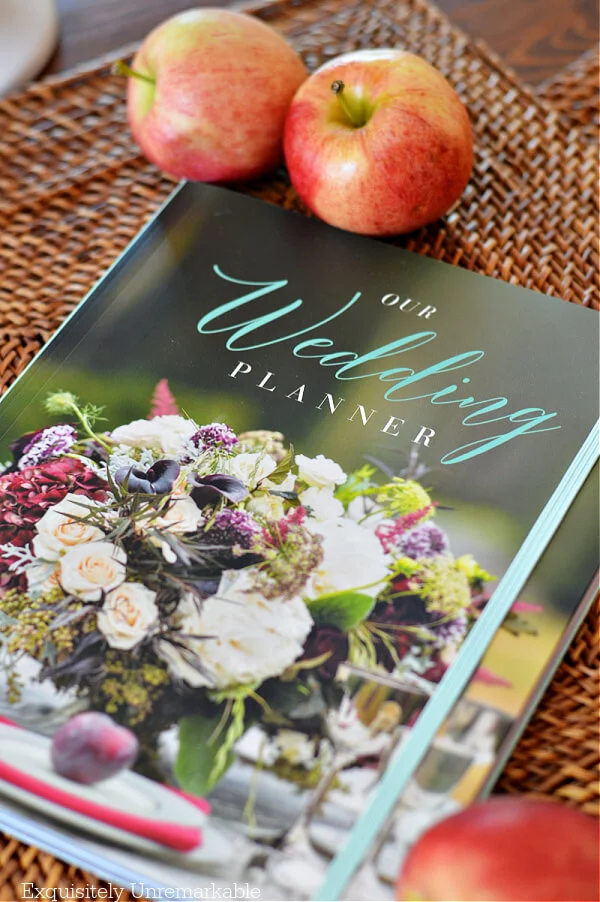 Our Wedding Planner Alda Ellis on a table with apples