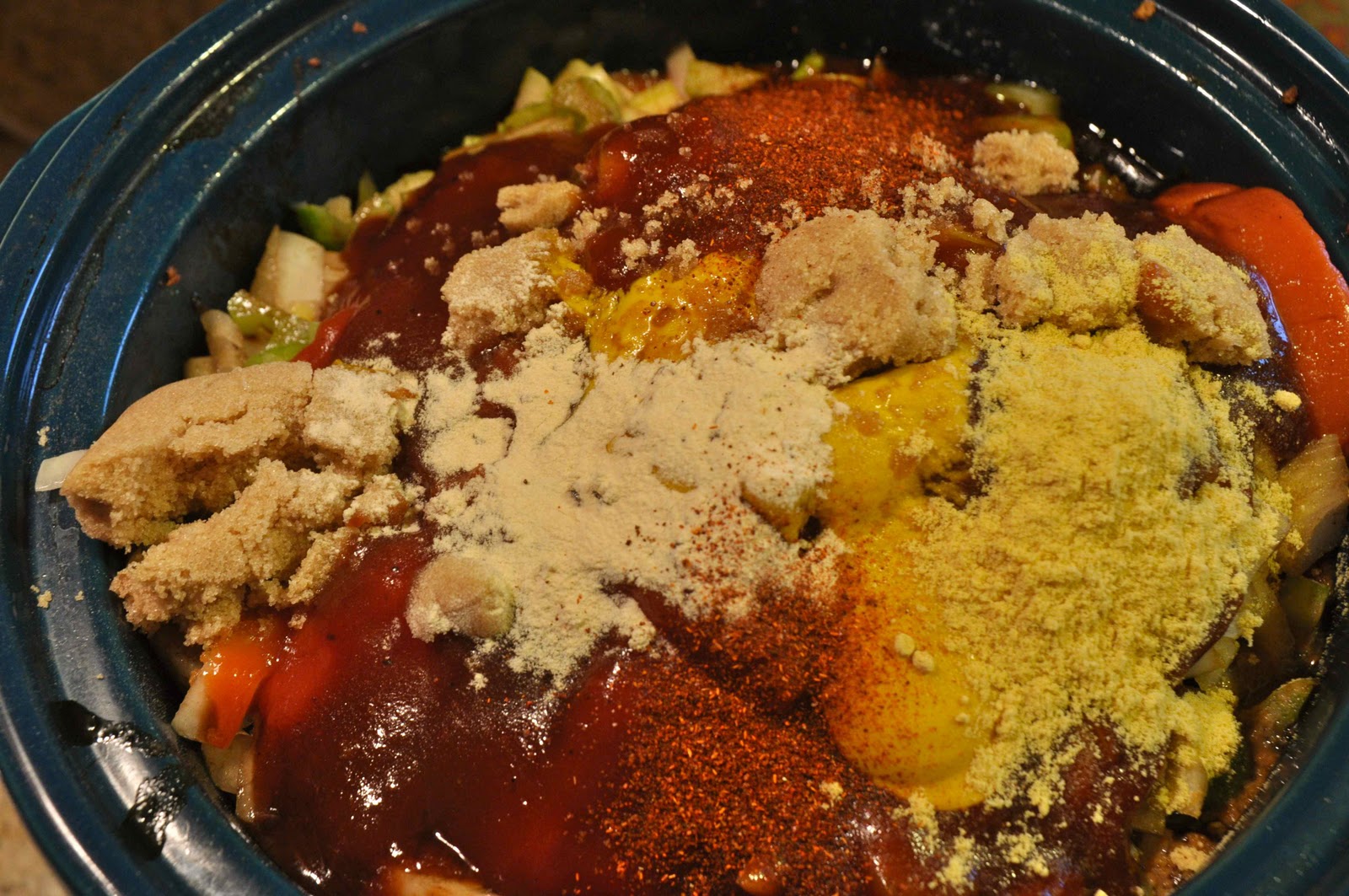 Stir the meat and sauce together to then slow cook for several hours.