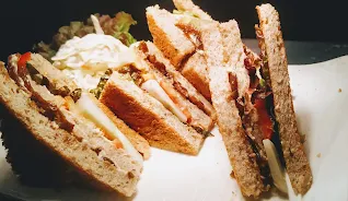 Four pieces of veg club sandwich with fries and Coleslaw food recipe
