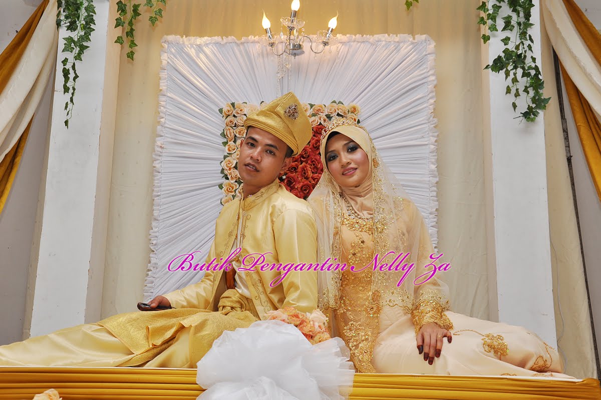 baju pengantin warna cream gold 