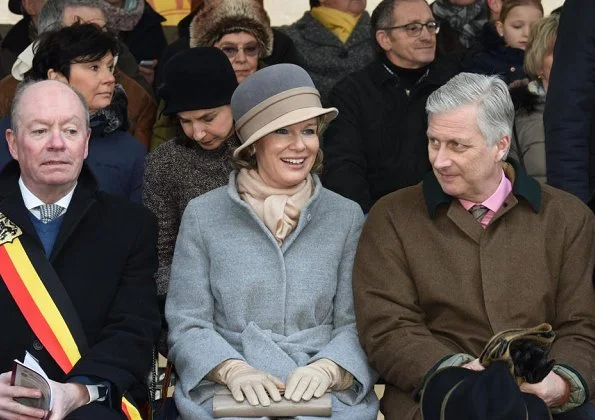 Queen Mathilde and King Philippe attended the Krakelingen Festival held in Geraardsbergen. Queen Mathilde wore Natan coat and Natan boots