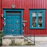 Green door in Bakklandet in Trondheim Norway